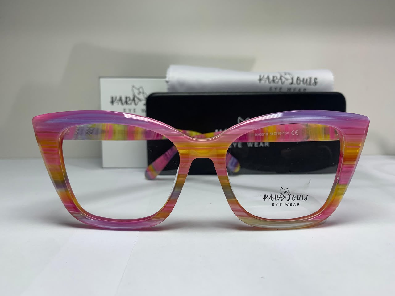 Kara Louis · Multicoloured Acetate — Bold statement frame in vibrant multicoloured acetate for a playful, distinctive look.